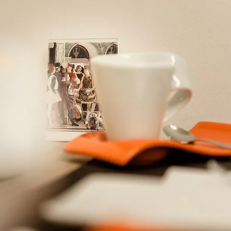 Alojamento de Acomodação e Pequeno-almoço Ferrara Rooms 4*